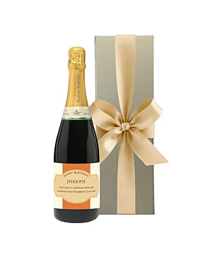 Personalised champagne in a gold gift box for a special occasion. A stylish Champagne gift with a beautifully personalised label. 