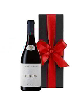 A bottle of Lothian Vineyards Pinot Noir standing next to a sleek black luxury gift box finished with a large, hand-tied ribbon.