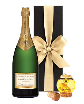A magnificent Magnum of Champagne Grande Reserve with a Gold Glass Keepsake Cork Keeper. The Magnum is presented in a luxury black gift box