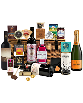 Deluxe Champagne, wine, and luxury drinks hamper with delicious treats. Beautifully presented in a large wicker hamper with a hand-tied ribbon 