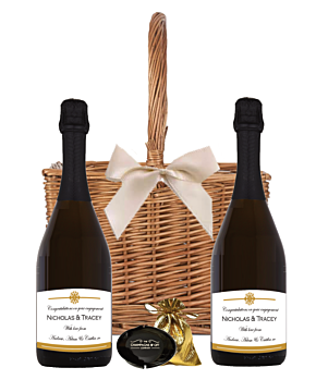 Two bottles of personalised Prosecco in a wicker basket double wine carrier