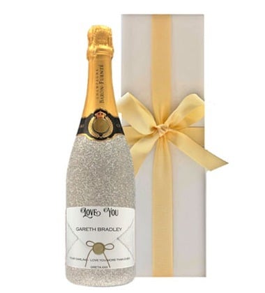 Personalised Champagne in simply stunning silver glitter bottle. Beautifully presented in a white gift box